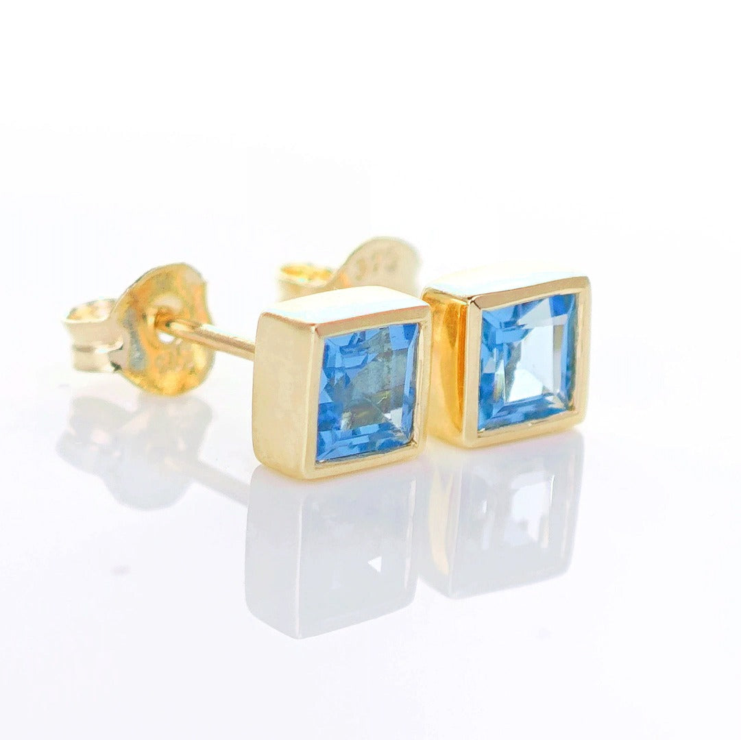 9ct Topaz Earrings Gold Studs Natural Light Swiss Blue Treated Gemstones 0.76ct