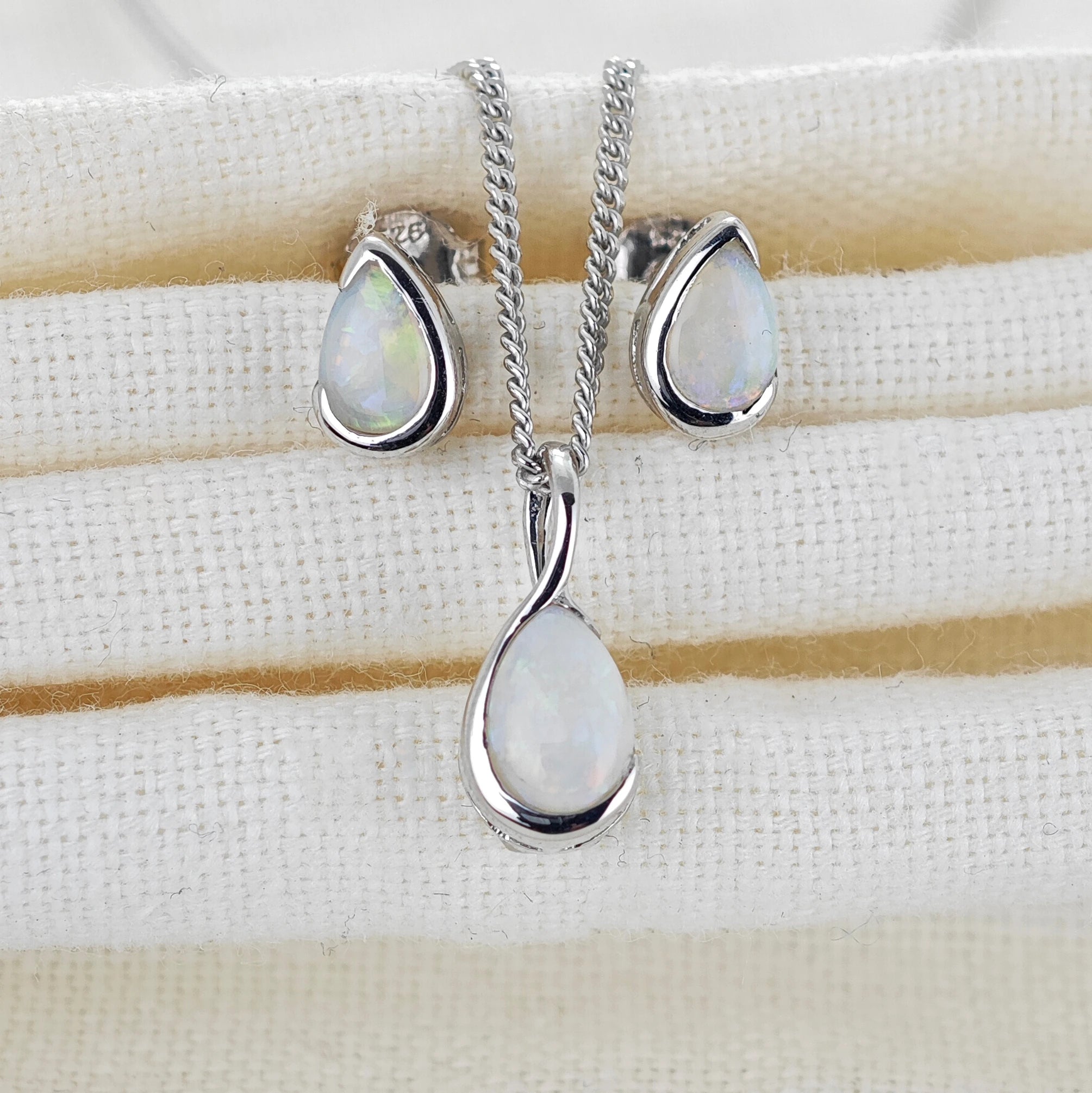 White opal infinity loop pendant and earrings