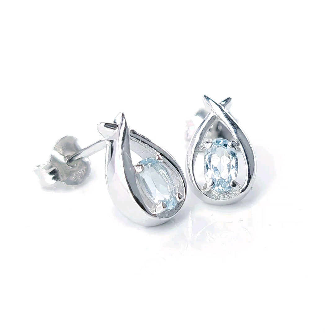 Topaz Earrings 0.5ct Pear Blue Twist Studs Silver December Birthstone