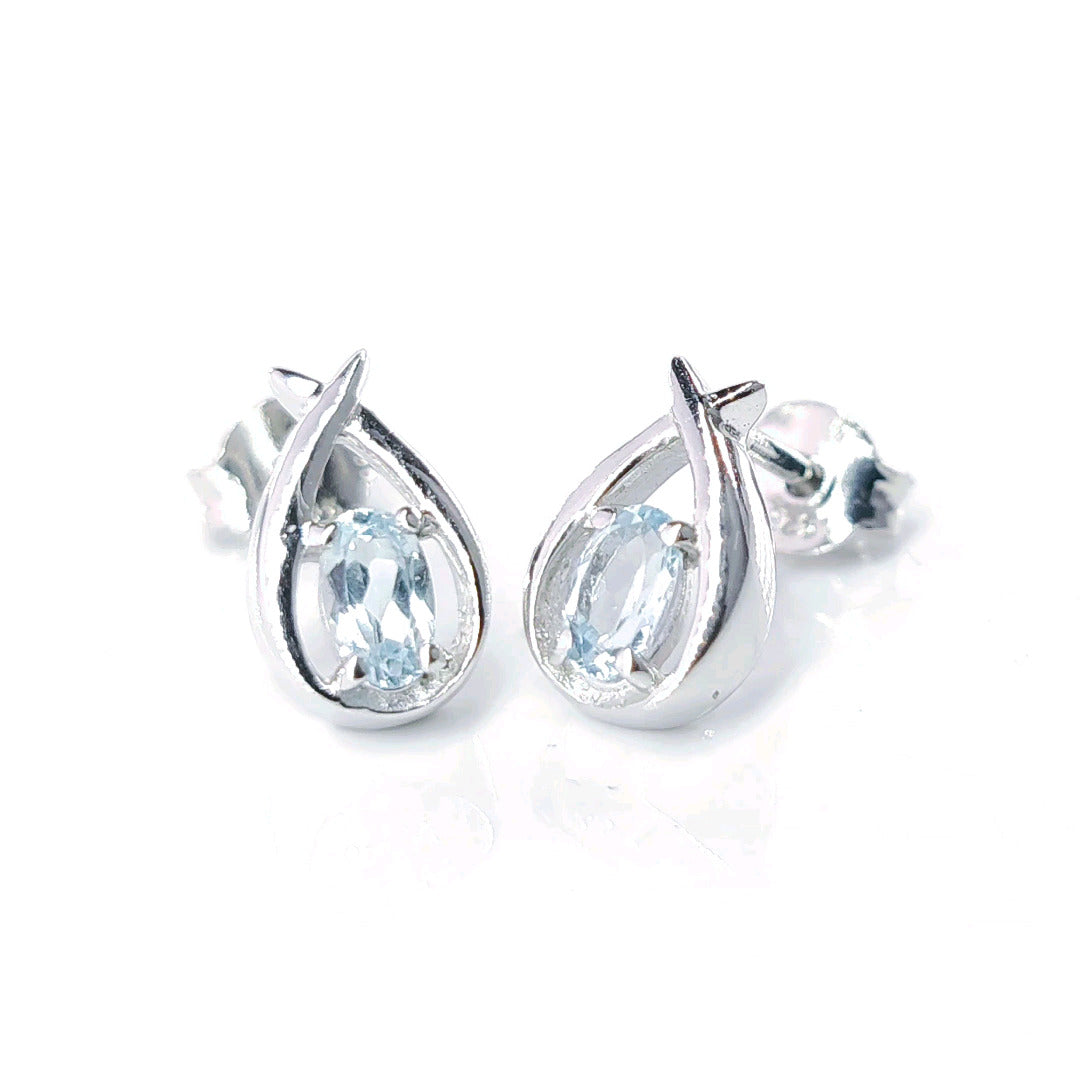 Topaz Earrings 0.5ct Pear Blue Twist Studs Silver December Birthstone