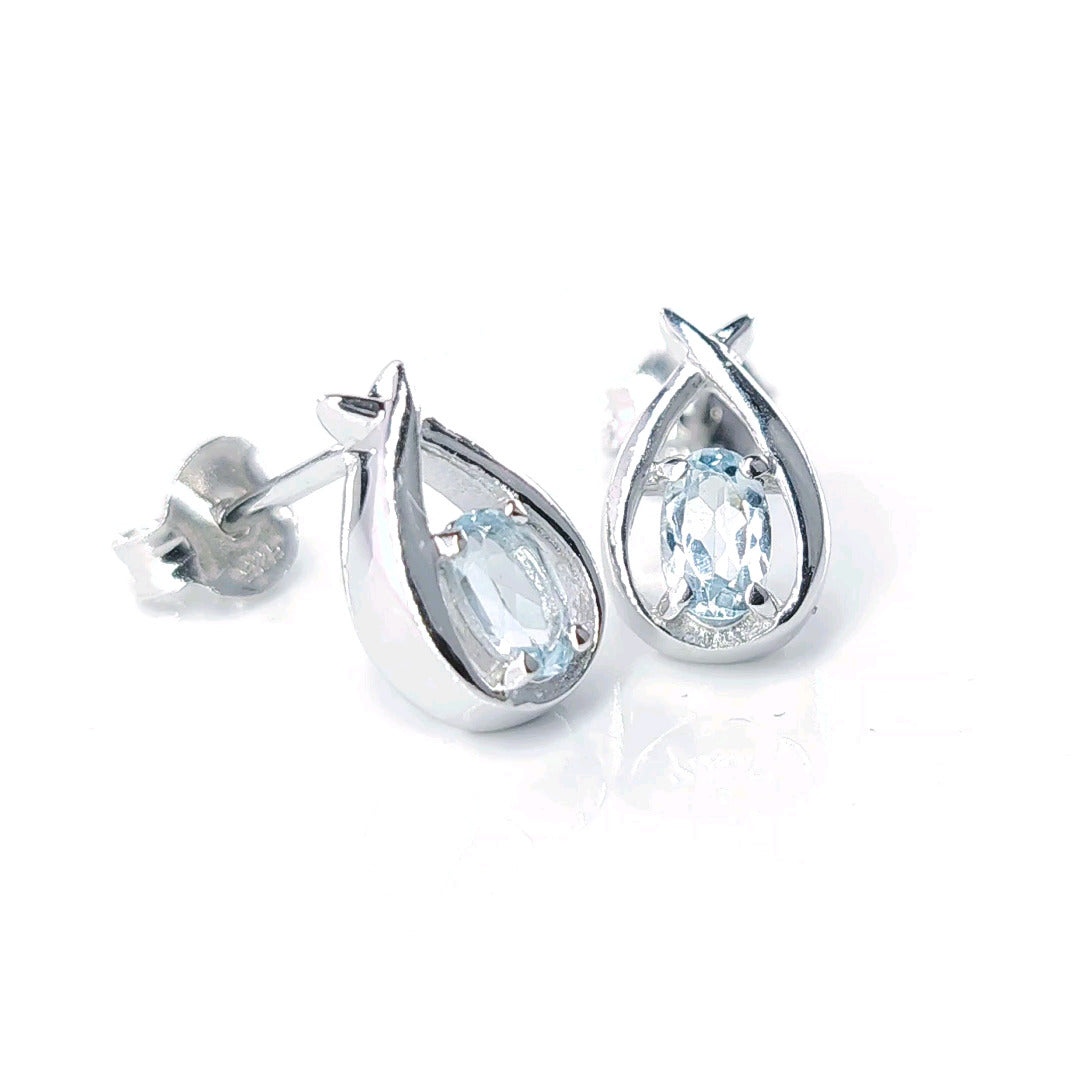 Topaz Earrings 0.5ct Pear Blue Twist Studs Silver December Birthstone