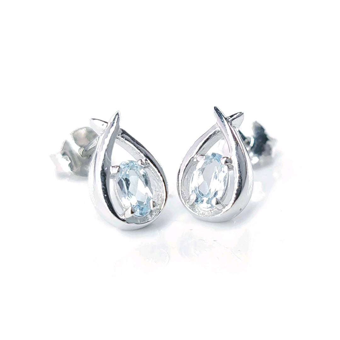 Topaz Earrings 0.5ct Pear Blue Twist Studs Silver December Birthstone