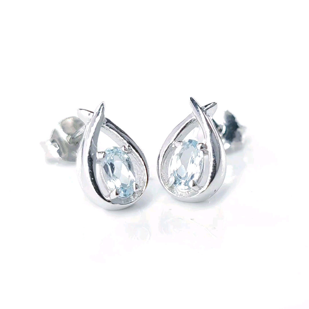 Topaz Earrings 0.5ct Pear Blue Twist Studs Silver December Birthstone