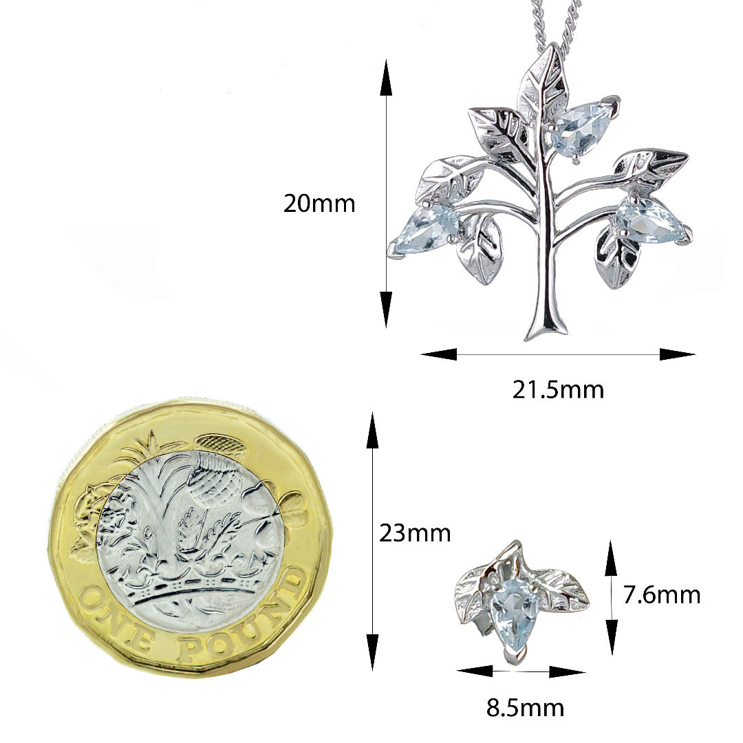 Aquamarine tree of life necklace earring set sterling silver dimensioned against one pound coin