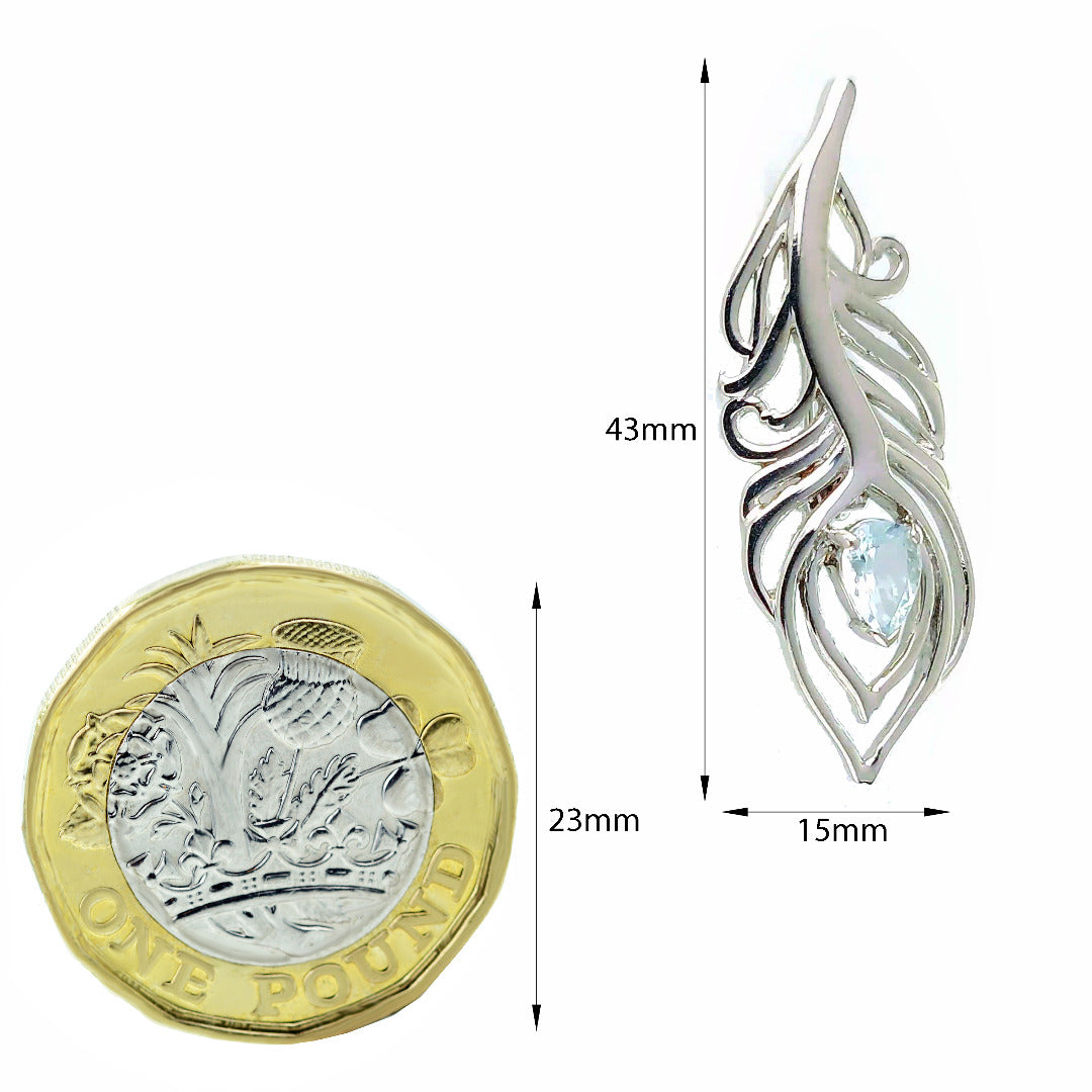 Aquamarine Peacock Feather Brooch dimensioned against pound coin