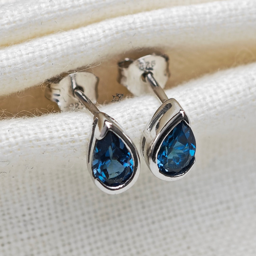 London Blue Topaz Earrings Sterling Silver Studs Infinity Loop