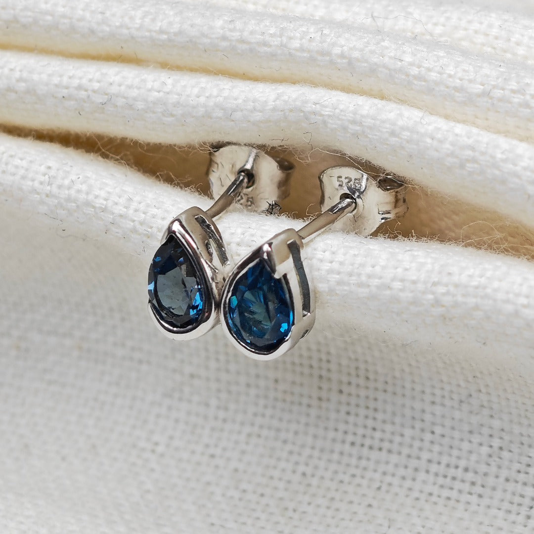 London Blue Topaz Earrings Sterling Silver Studs Infinity Loop