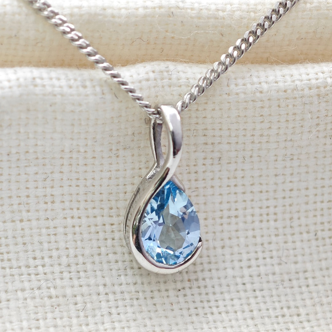 Blue Topaz Pendant Sterling Silver Infinity Loop