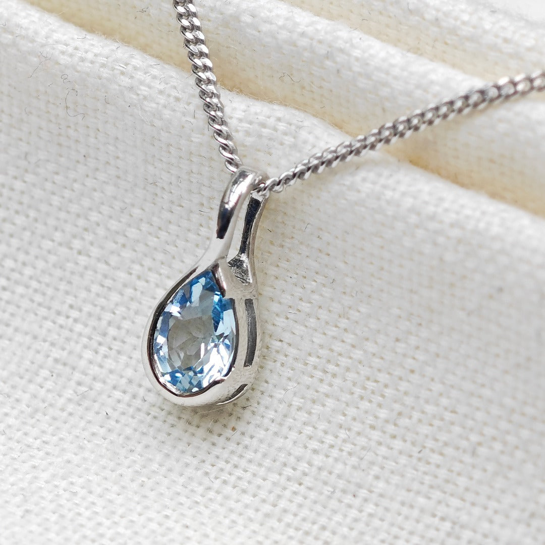 Blue Topaz Pendant Sterling Silver Infinity Loop