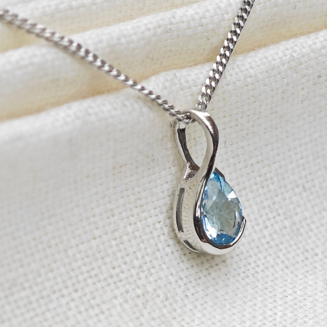 Blue Topaz Pendant Sterling Silver Infinity Loop