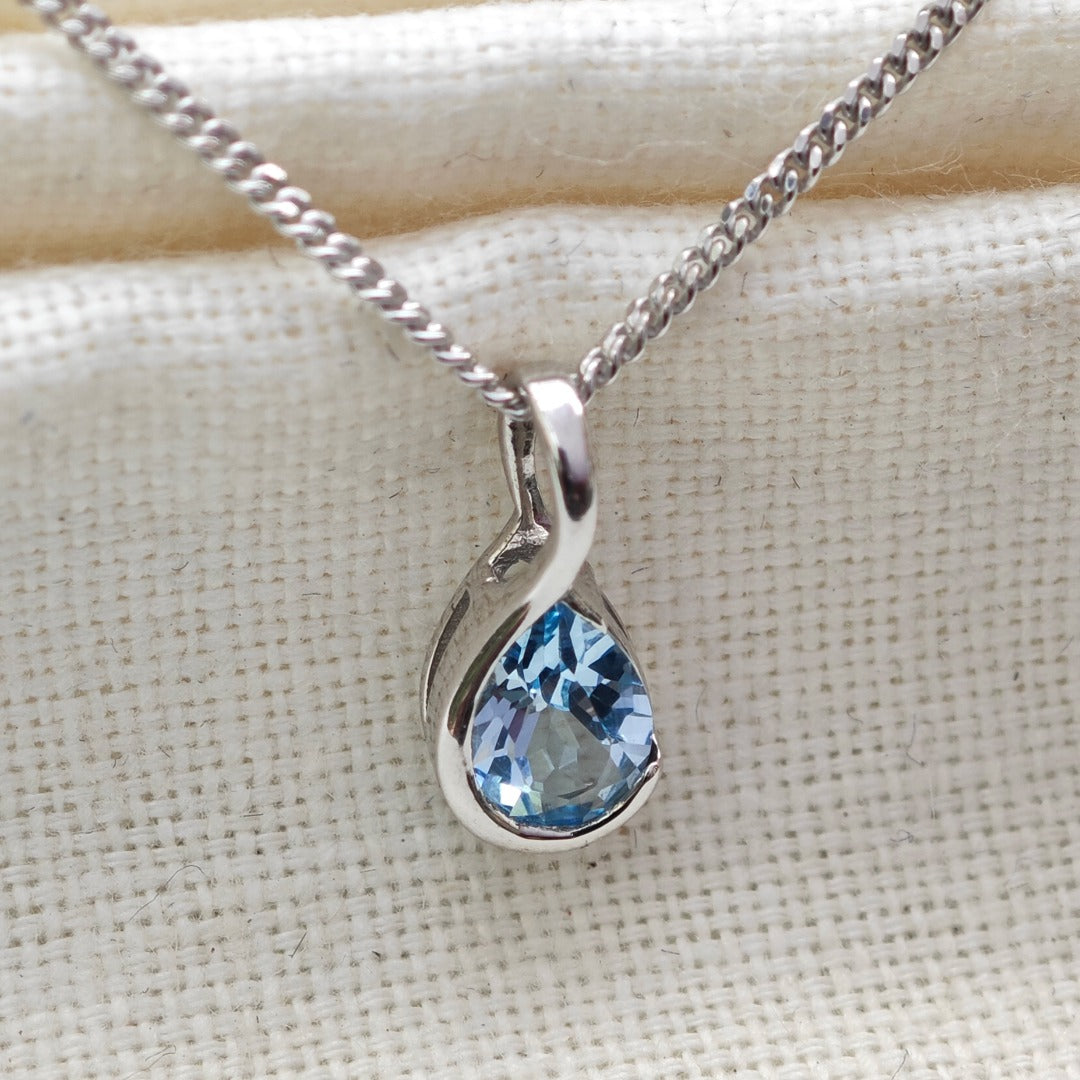 Blue Topaz Pendant Sterling Silver Infinity Loop