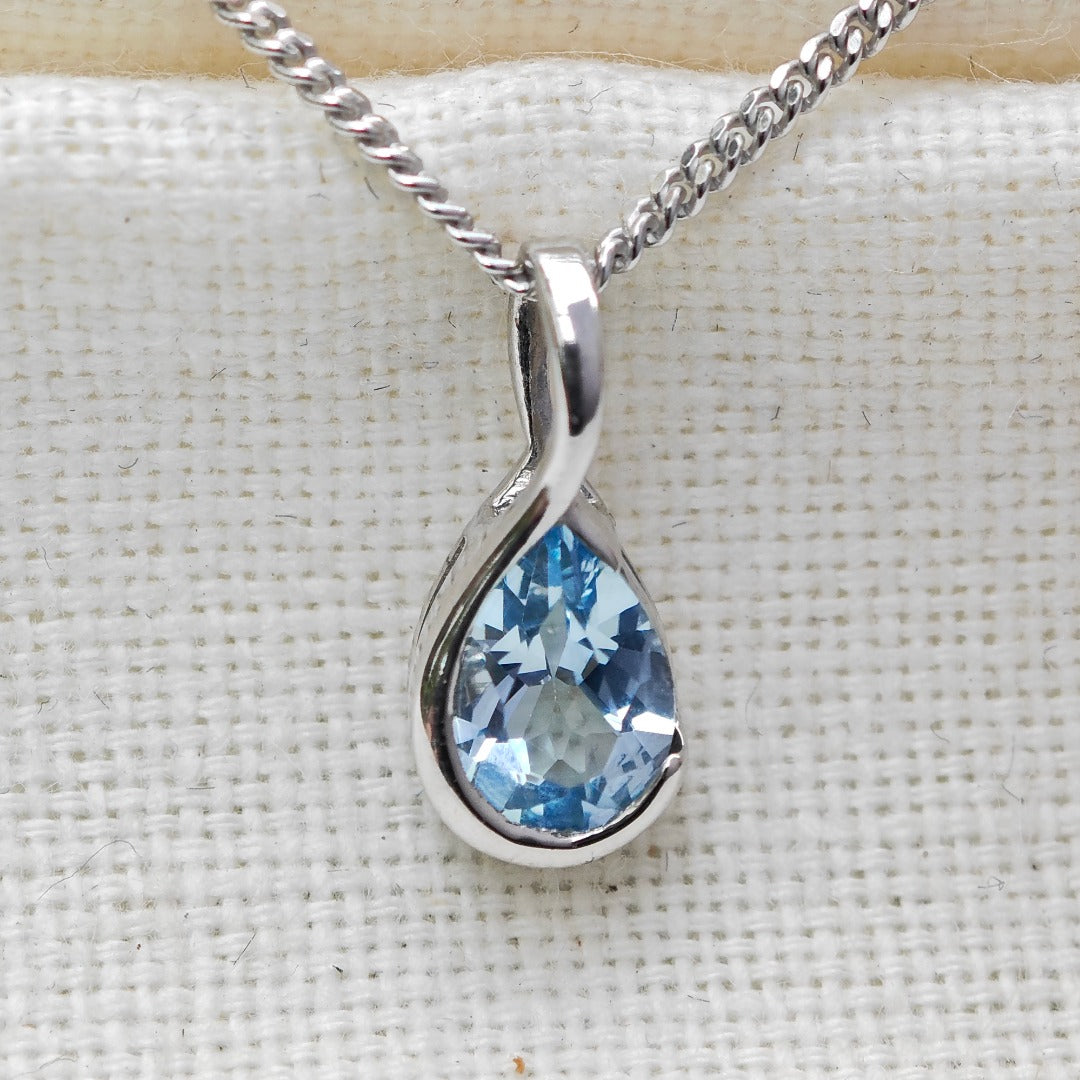 Blue Topaz Pendant Sterling Silver Infinity Loop