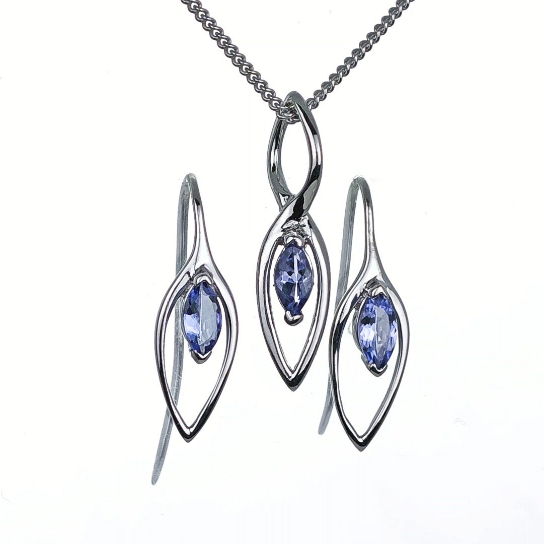 Tanzanite marquise stone set in infinity loop  of sterling silver pendant and coordinating dangle earrings with hook fastening