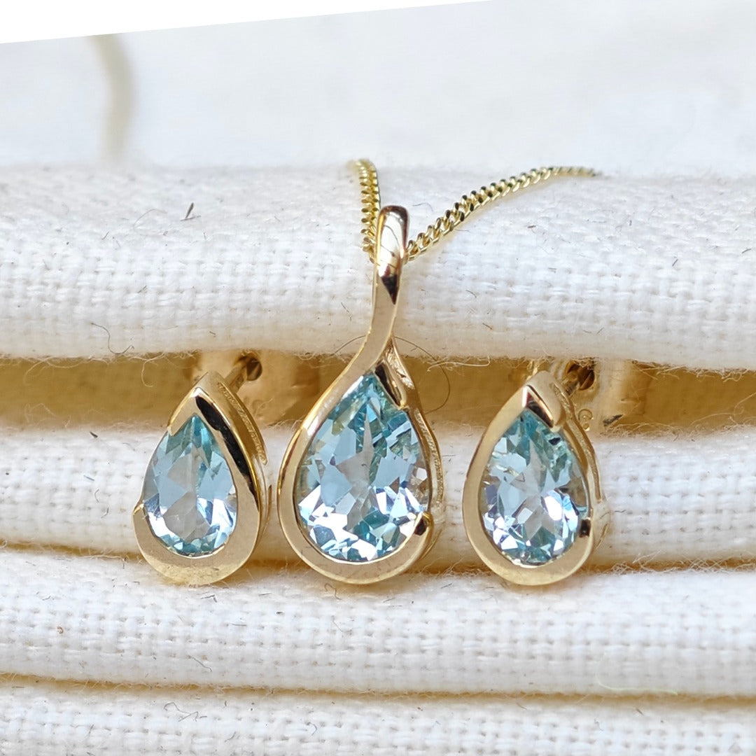 9ct Yellow Gold Blue Topaz Set Pendant Stud Earrings Infinity Loop