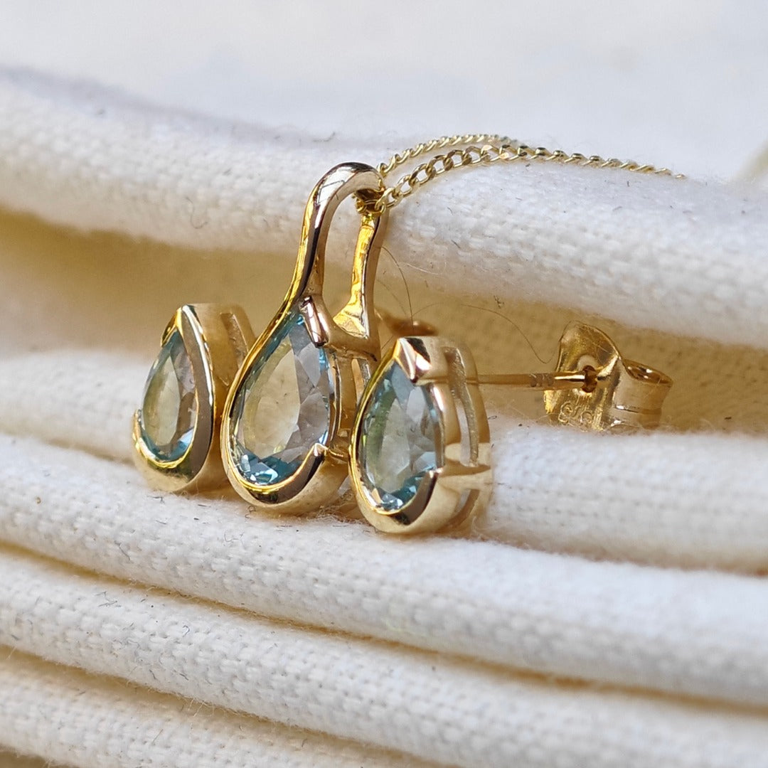 9ct Yellow Gold Blue Topaz Set Pendant Stud Earrings Infinity Loop