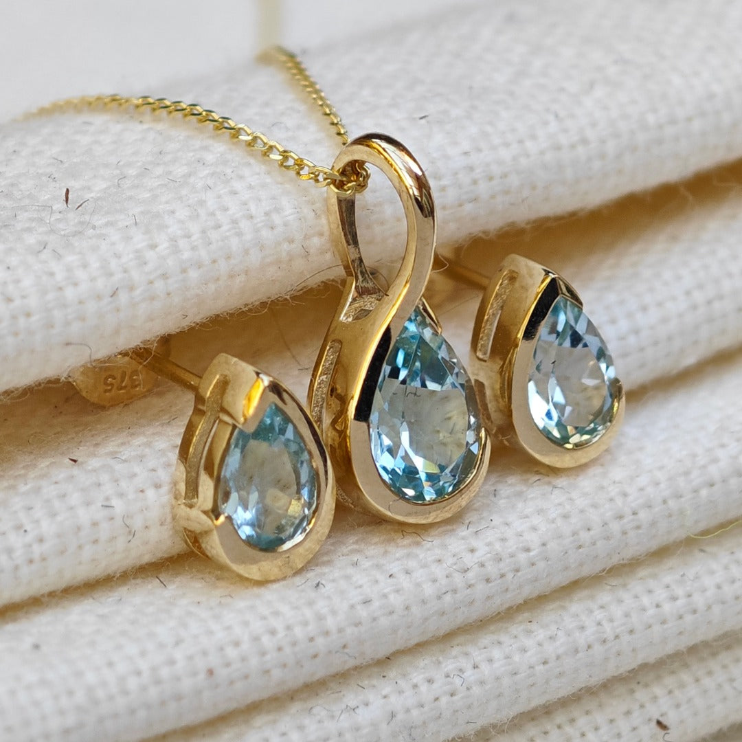 9ct Yellow Gold Blue Topaz Set Pendant Stud Earrings Infinity Loop