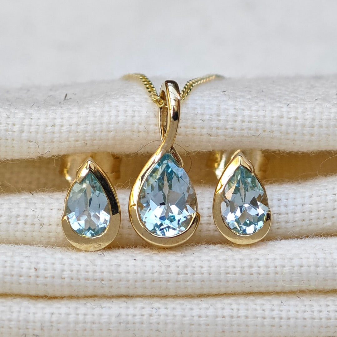 9ct Yellow Gold Blue Topaz Set Pendant Stud Earrings Infinity Loop