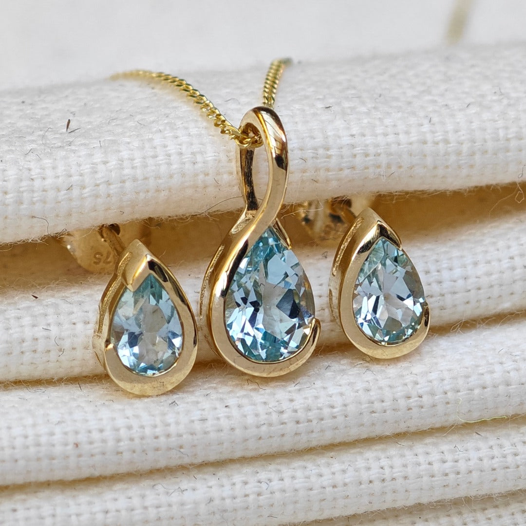 9ct Yellow Gold Blue Topaz Set Pendant Stud Earrings Infinity Loop